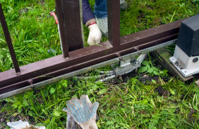 Automatic gate maintenance on a sliding gate motor and track system, part of reliable automatic gate servicing by Auto Gate Guys Perth Automatic gate maintenance on a sliding gate motor and track system, part of reliable automatic gate servicing by Auto Gate Guys Perth